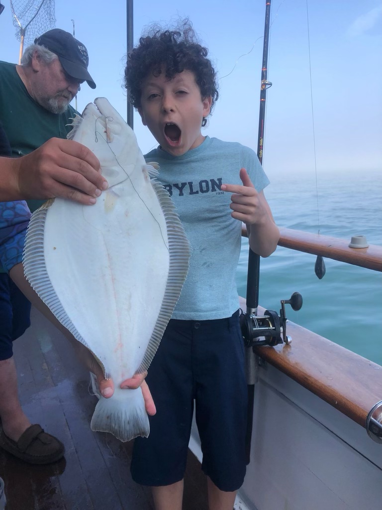 Felix with his First Fluke Catch!